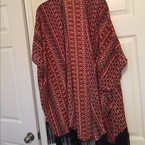 Aztec inspired shawl with fringe at the ends